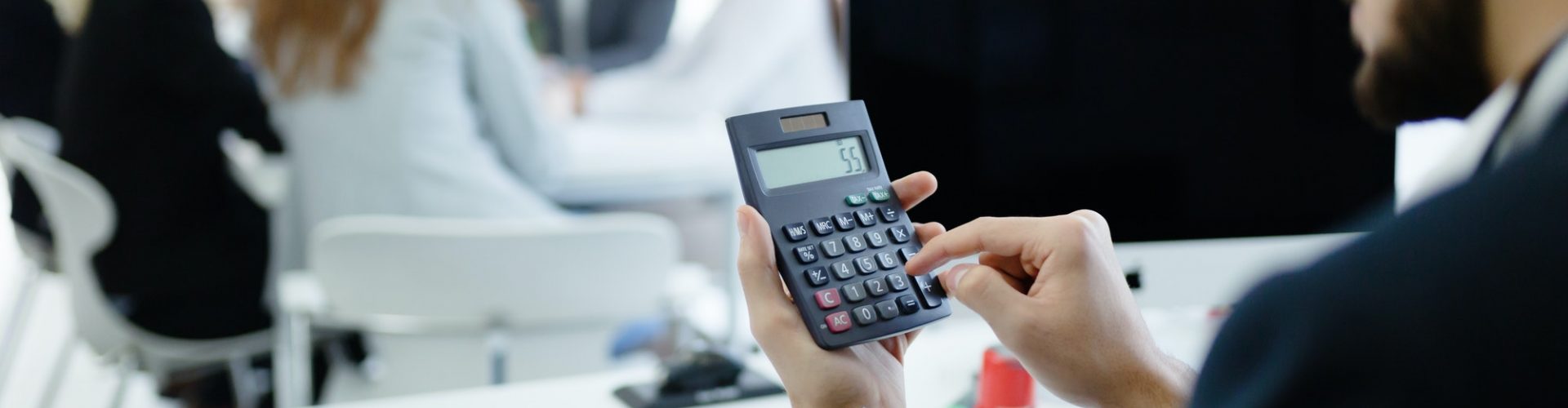 Accountant checking statistics of company